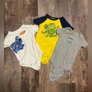 Three 12 month baby onsies